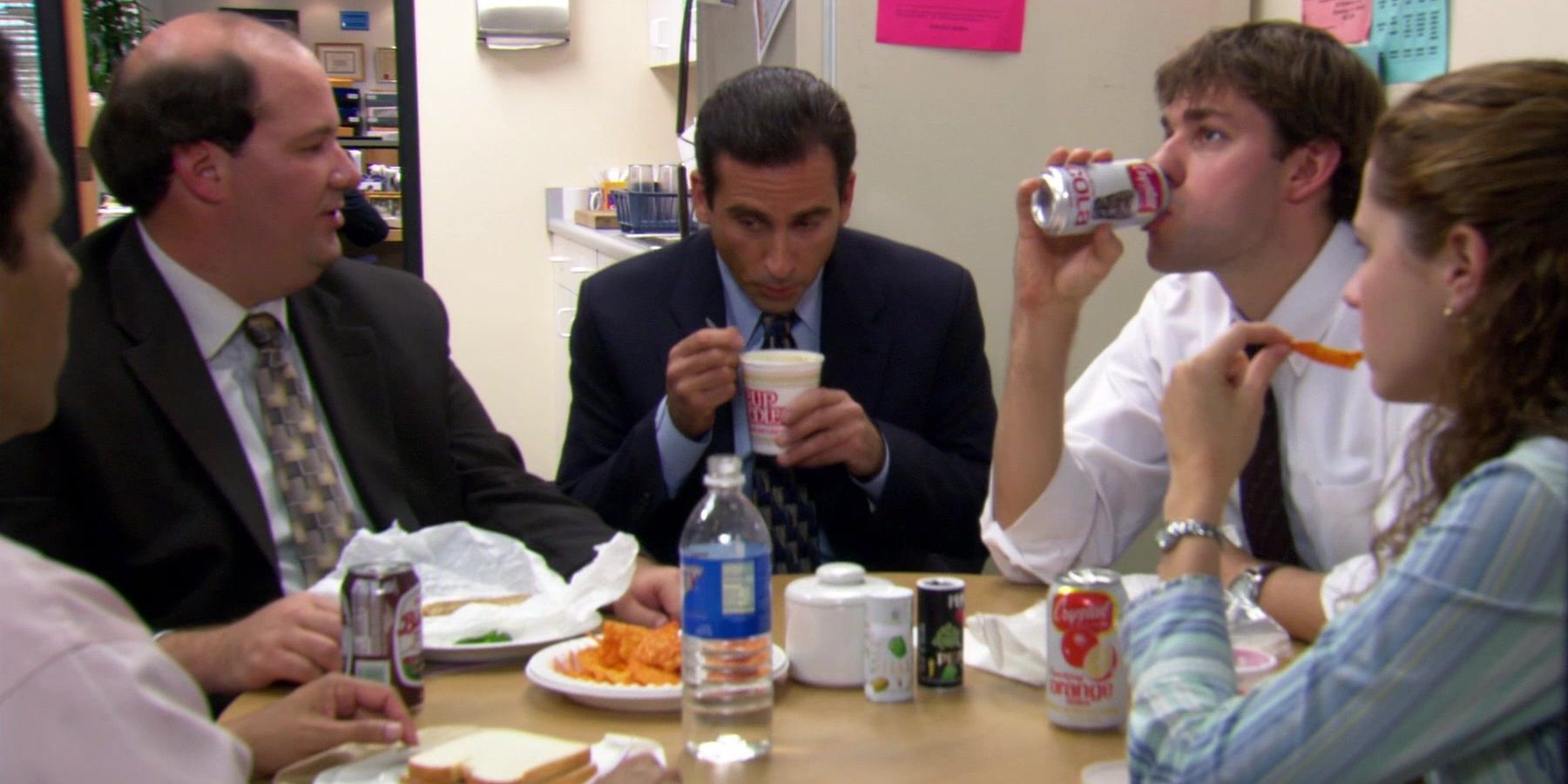 Kevin, Michael, Jim, and Pam sitting at a table in Email Surveillance episode The Office