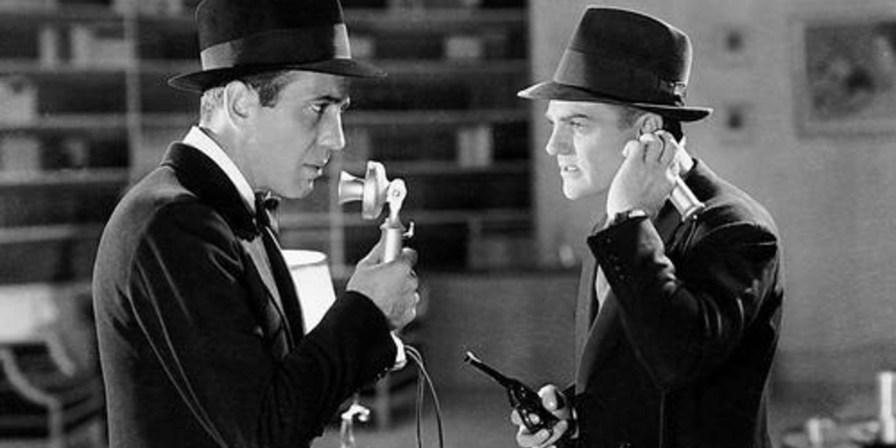 Humphrey Bogart and James Cagney talk on the phone in Angels with Dirty Faces.