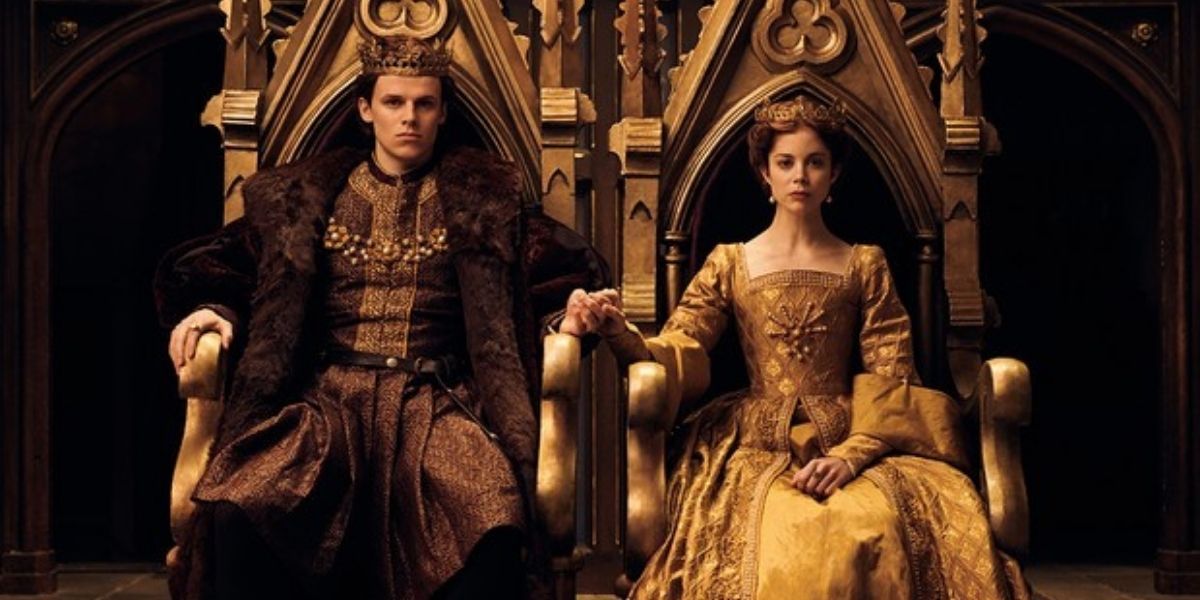 the King and Queen sit on their thrones in The Spanish Princess