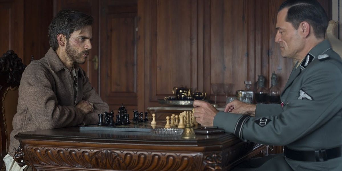 Two characters playing chess in The Chess Player 2017