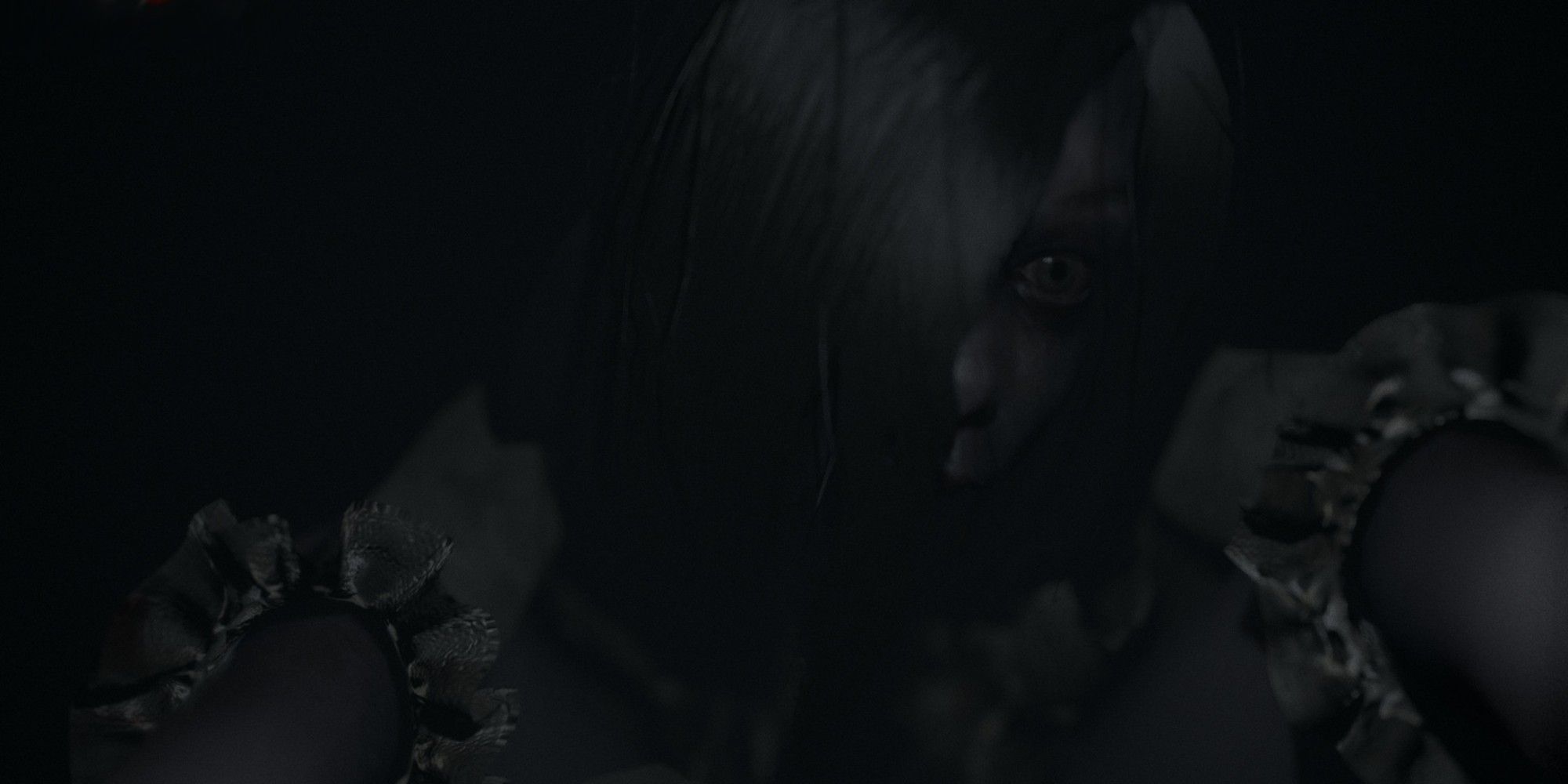 Lucy grabs the player in Visage