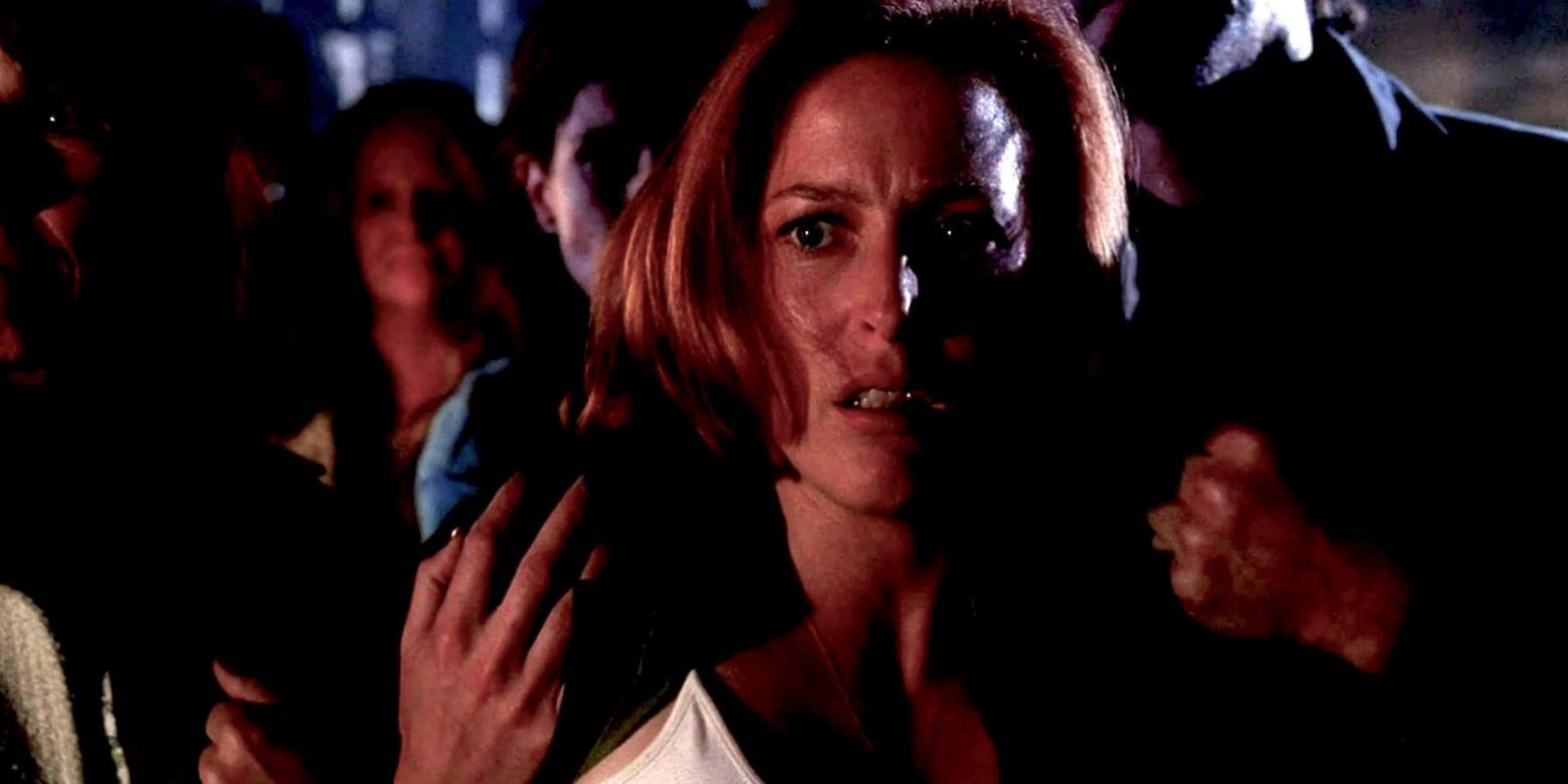 Scully is grabbed by cult members in X-Files episode &quot;Roadrunners&quot;