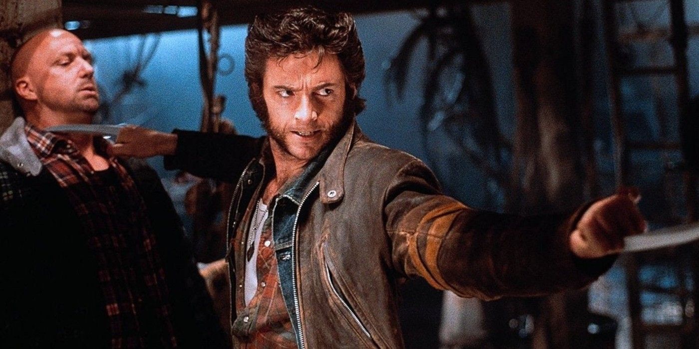 Wolverine threatens thugs with his claws