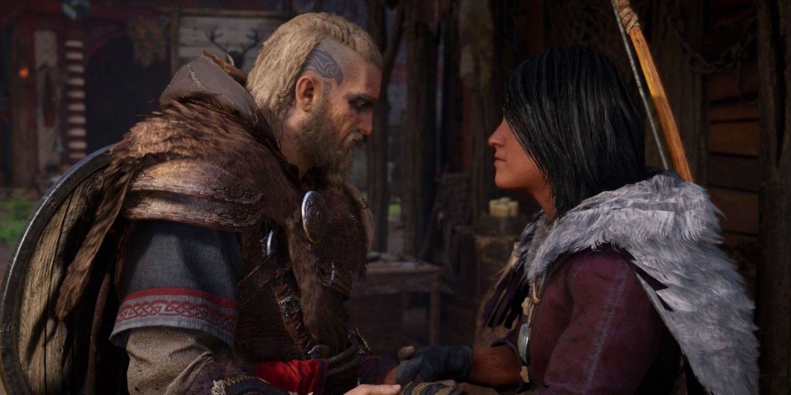 Male Eivor holding Petra's hands as they confess their love for each other in AC Valhalla.