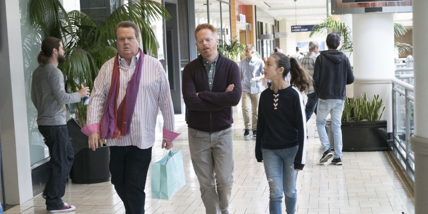 Cam, Mitch and Lily at a mall on Modern Family