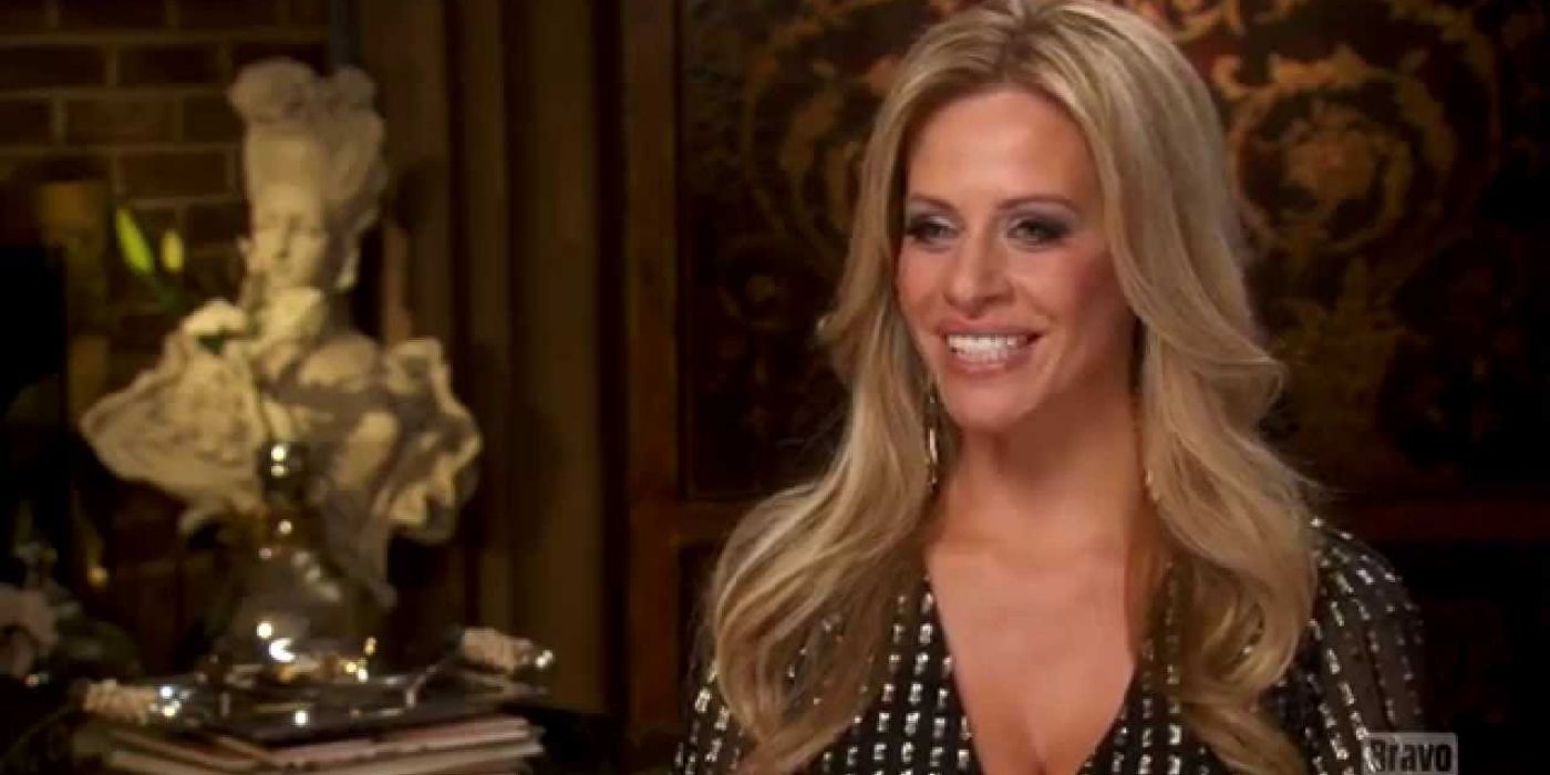 Dina Cantin smiling in a confessional for RHONJ