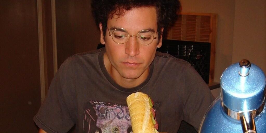 Ted eating a sandwich 