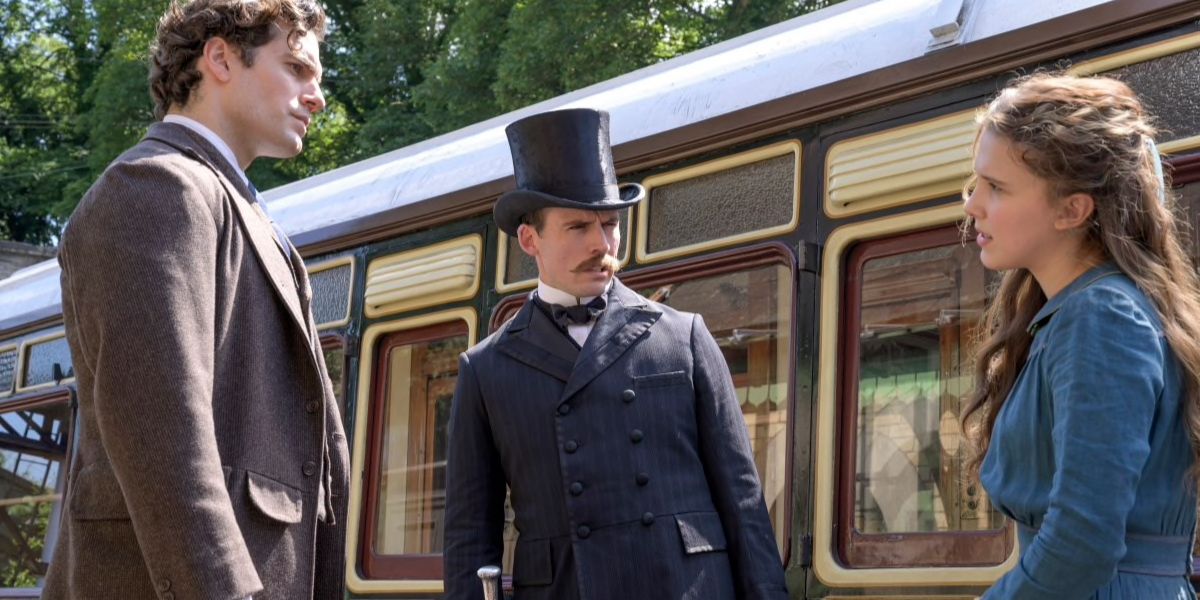 Mycroft, Sherlock and Enola in train scenes in Enola Holmes movie