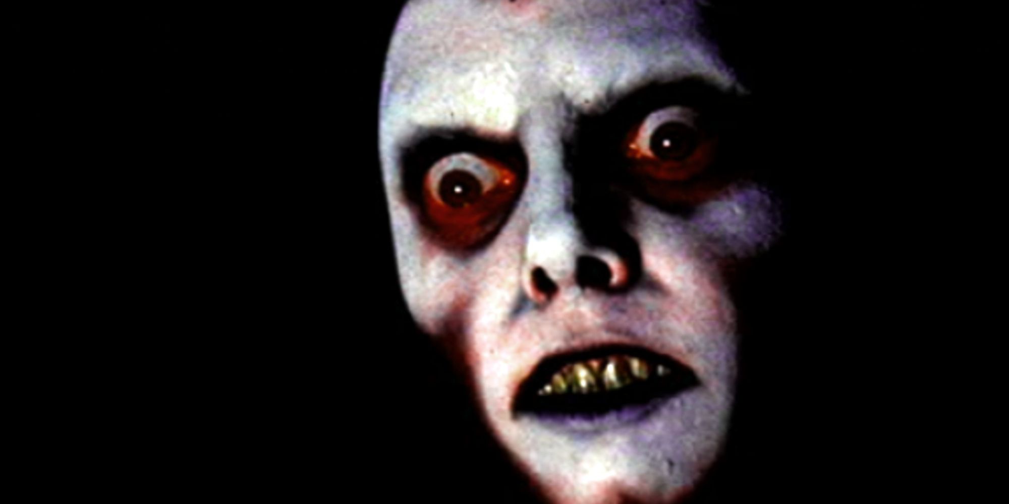 Pazuzu surrounded by darkness in The Exorcist.