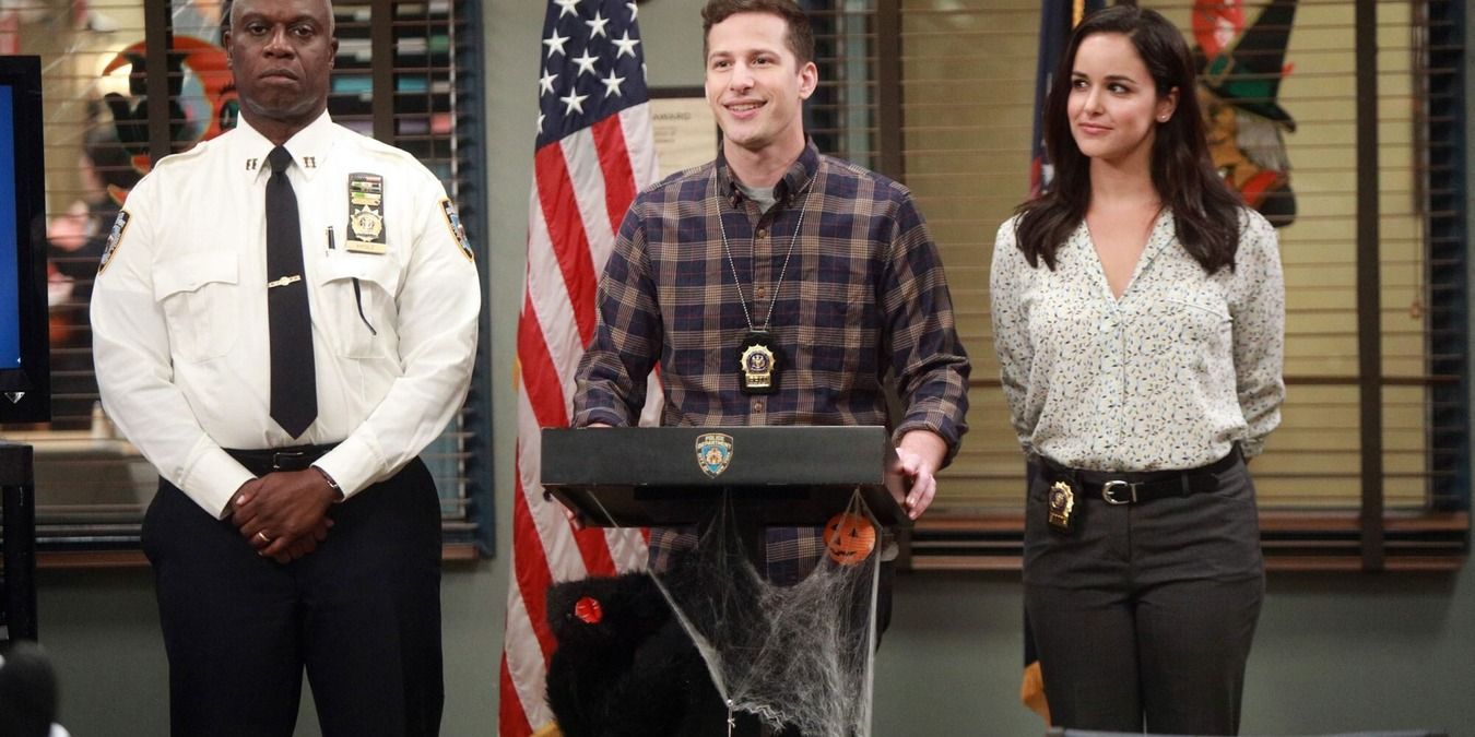Holt, Jake, and Amy stand together on Brooklyn 99