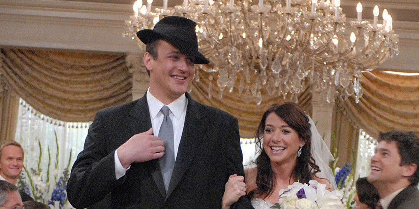 Lily and Marshall walk down the aisle in How I Met Your Mother