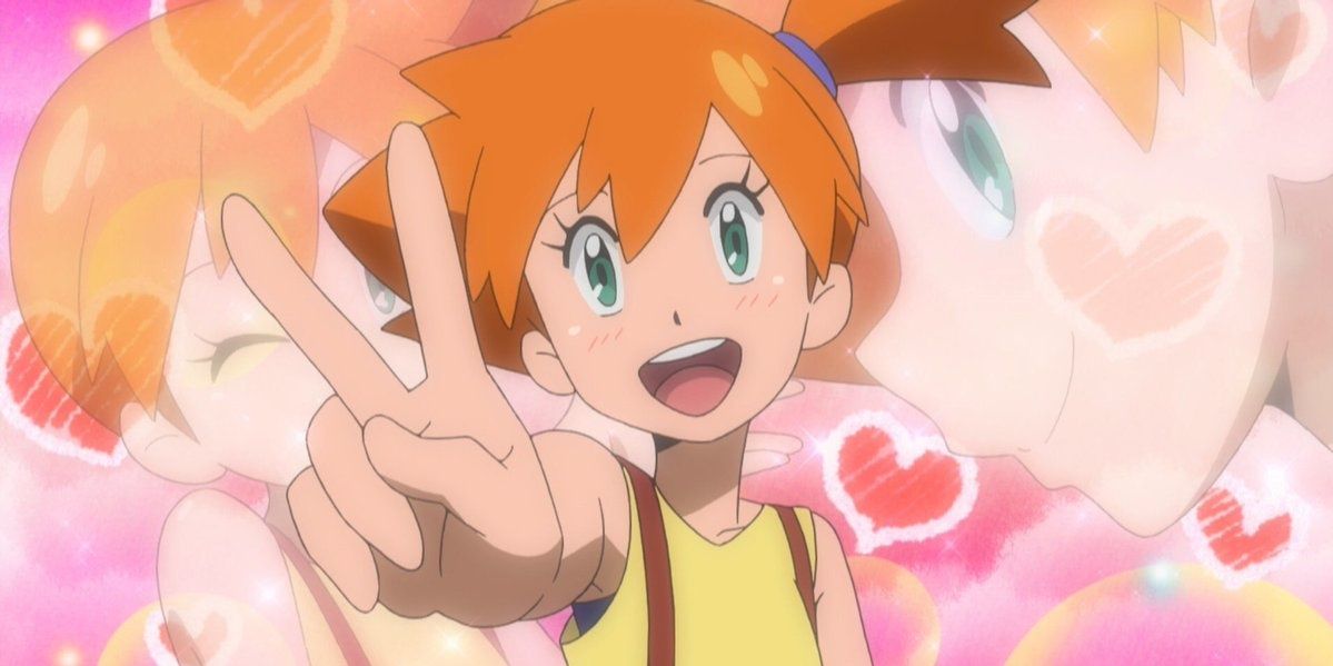 Misty smiling and doing the peace sign