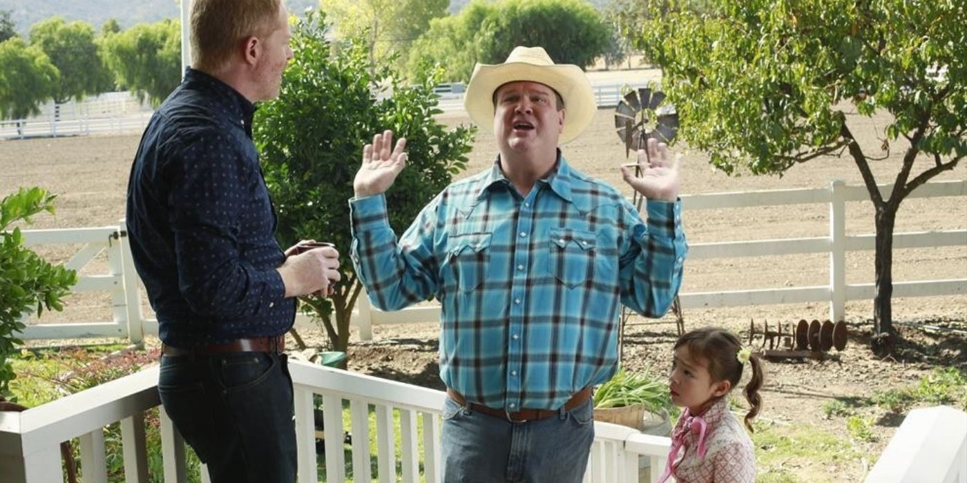 Mitch talks to Lily and Cam on the farm in Modern Family