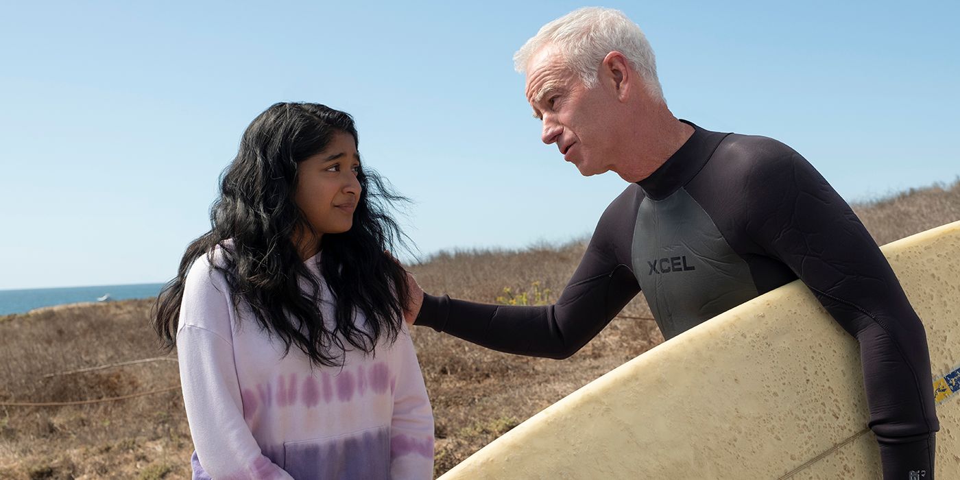 Devi meets John McEnrore while surfing at the beach