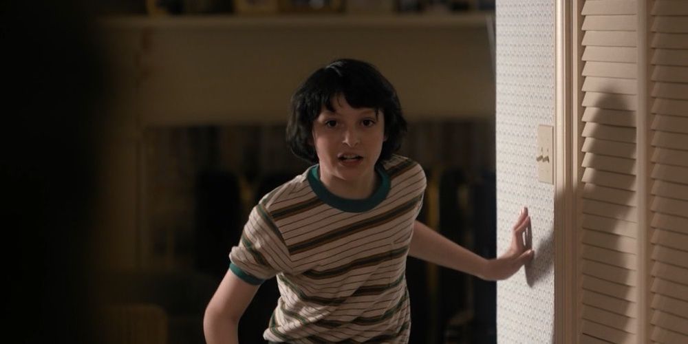 Mike from Stranger Things yells while preparing to run down to the basement