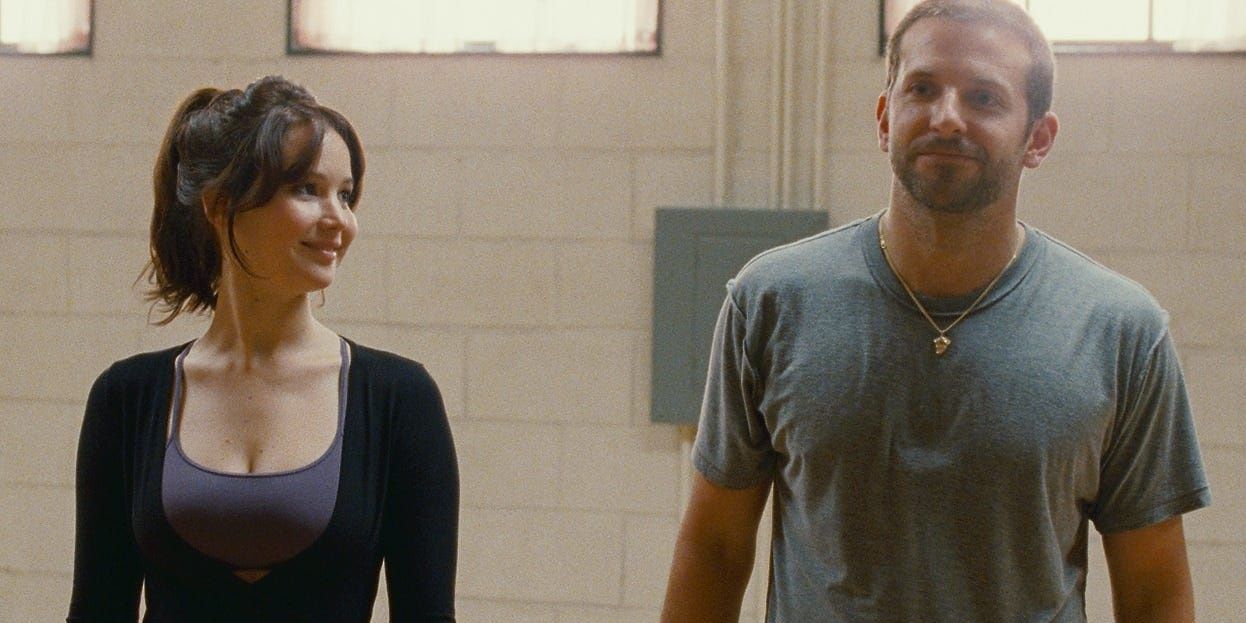 Jennifer Lawrence and Bradley Cooper in sweaty clothes in Silver Linings Playbook