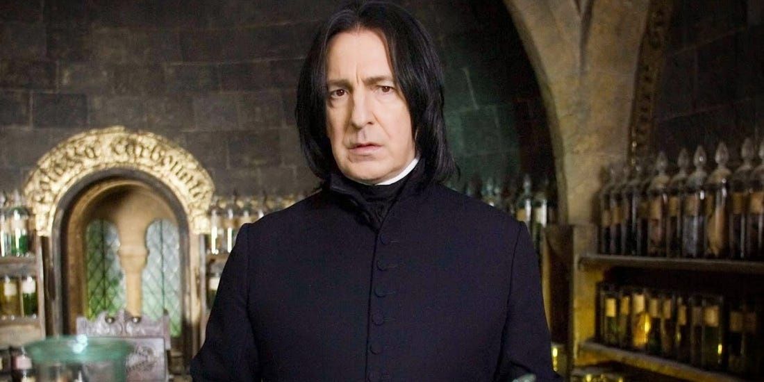 Snape is standing in his potions classroom.