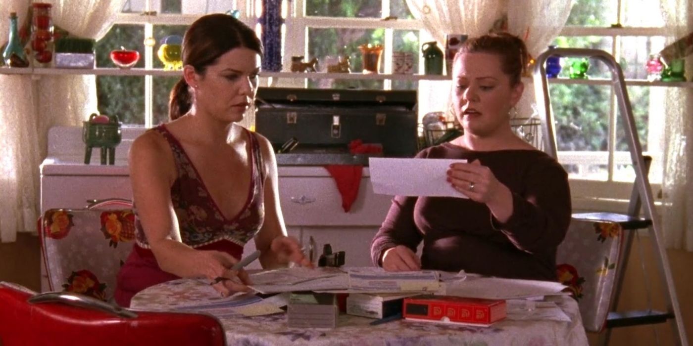 Sookie and Lorelai looking at letters on Gilmore Girls