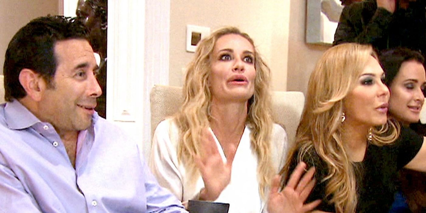 Taylor Armstrong in shock at a dinner party with the Housewives on RHOBH