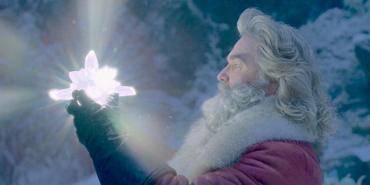 The Christmas Chronicles scene with Santa Claus holding the Christmas star
