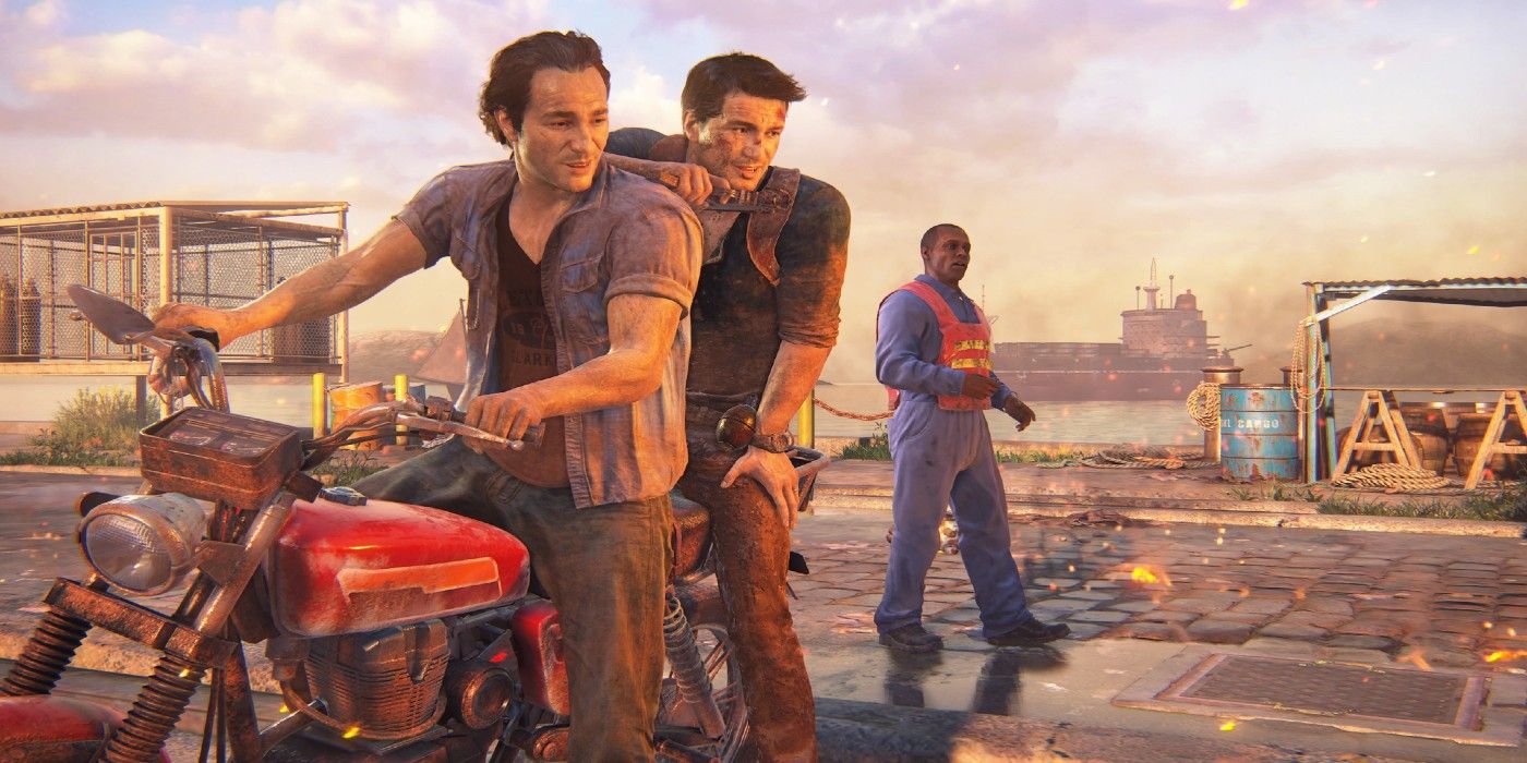 Drake sits on the back of a motorbike with Sam on the front in A Thief’s End