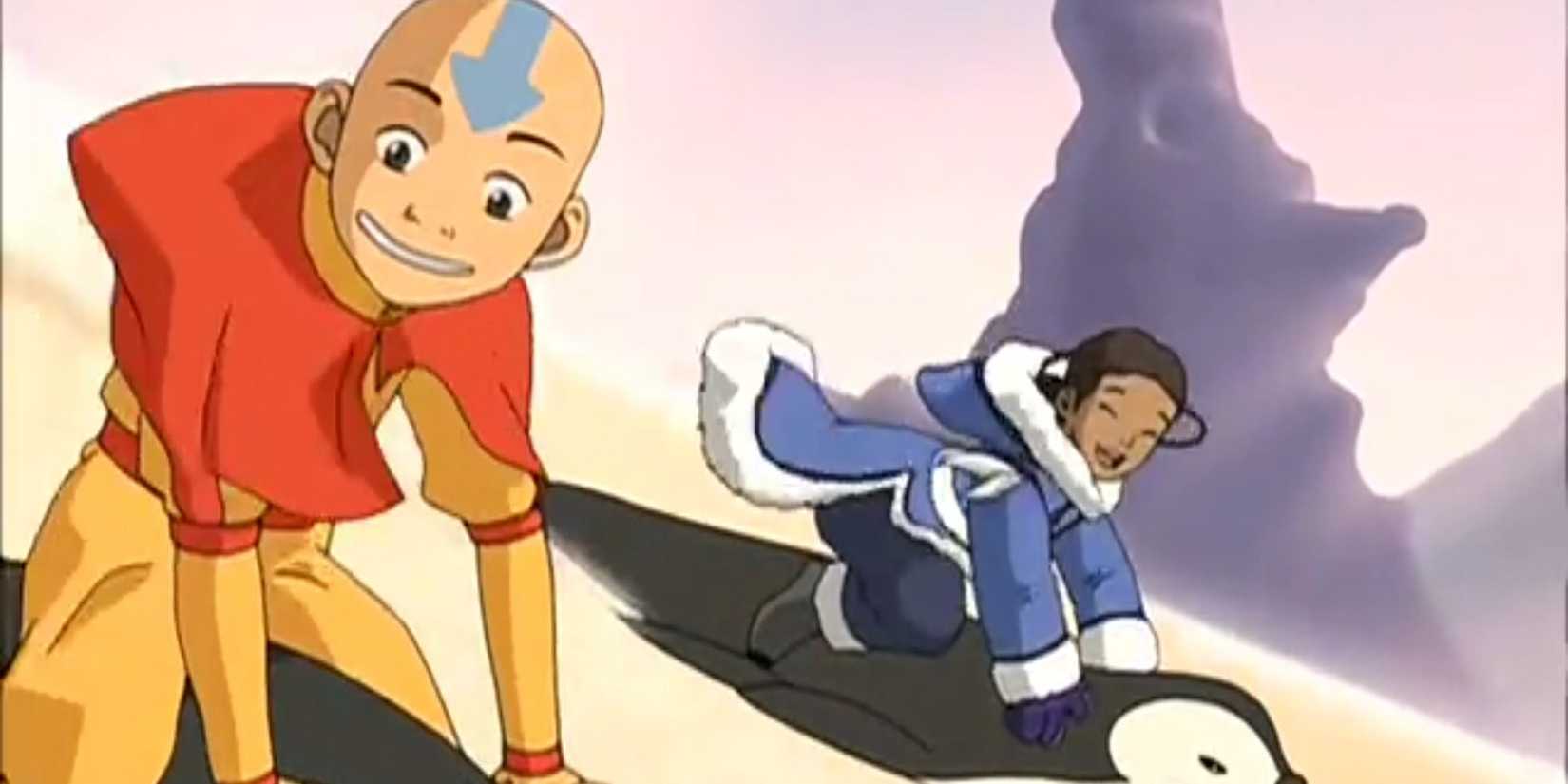 aang and katara go penguin sledding in avatar the last airbender