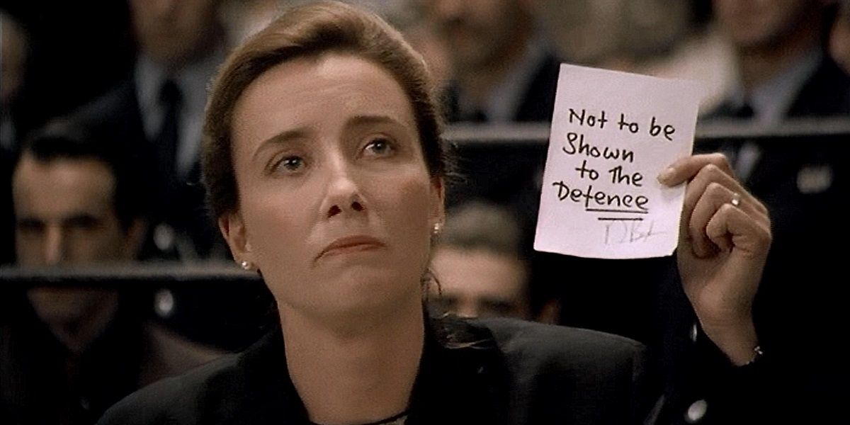 Gareth holds up a note in In the Name of the Father