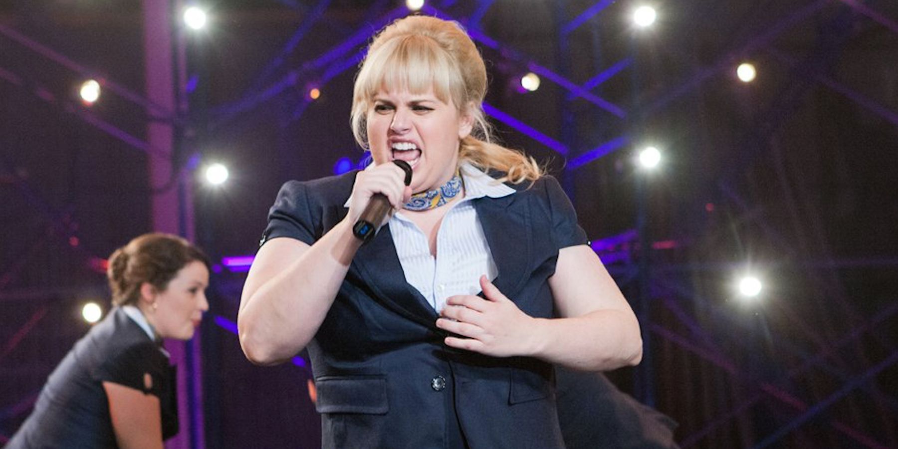 Amy performing on stage In Pitch Perfect