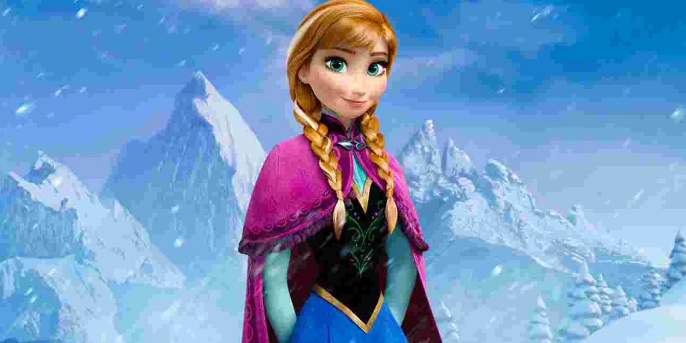 Anna in Frozen stands in front of a mountain landscape.