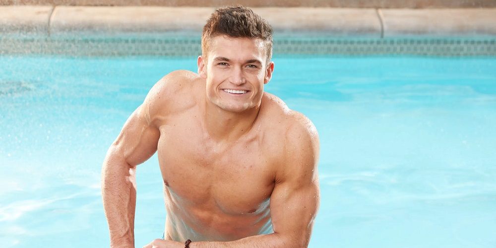 Jackson Michie coming out of a pool in Big Brother.