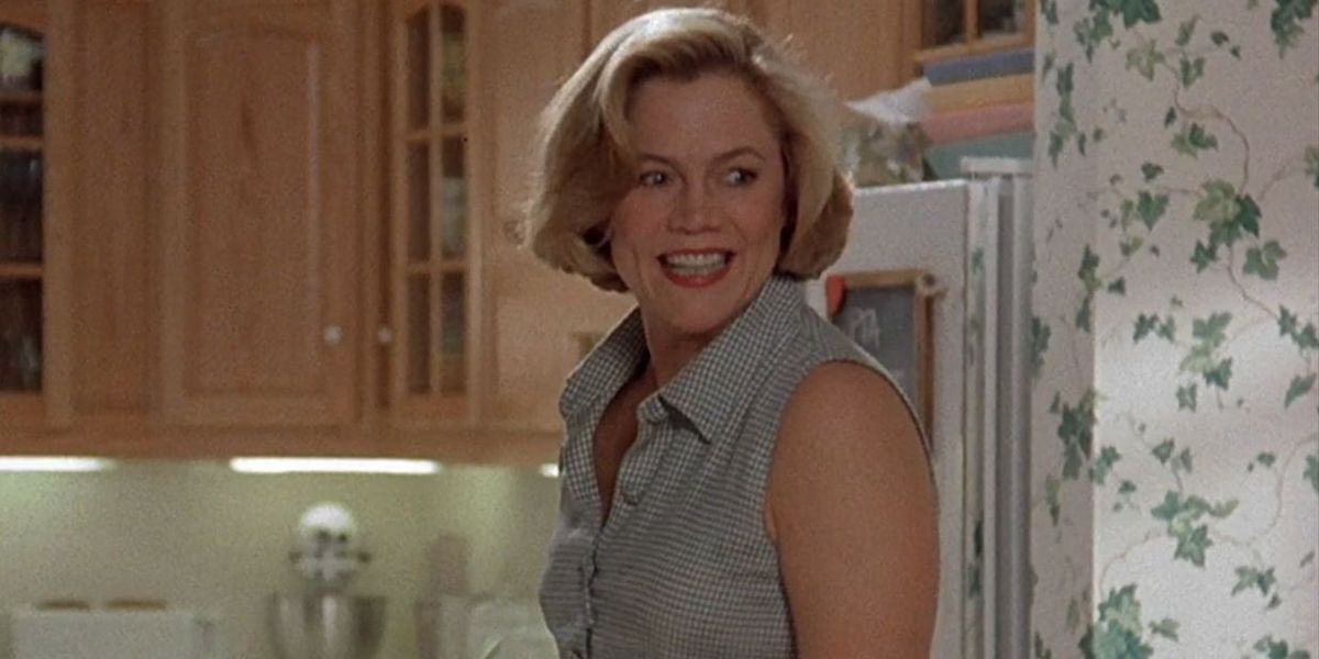 Beverly Sutphin smiles in the kitchen in Serial Mom