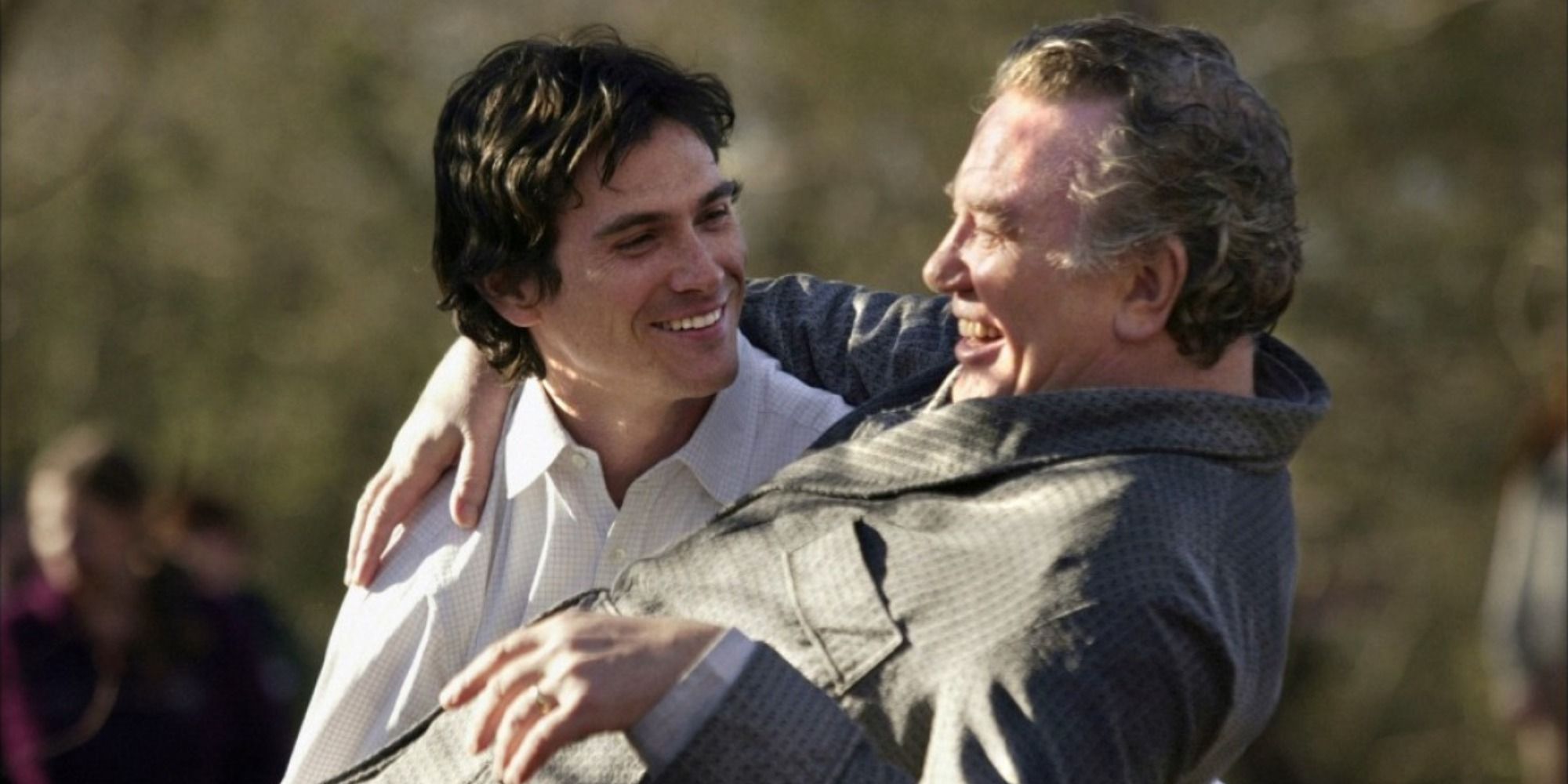 Will carries Edward senior as they both laugh in Big Fish.