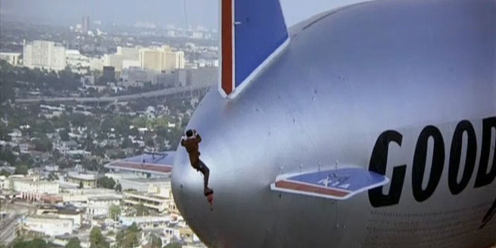 A man on the outside of a blimp in Black Sunday (1977)