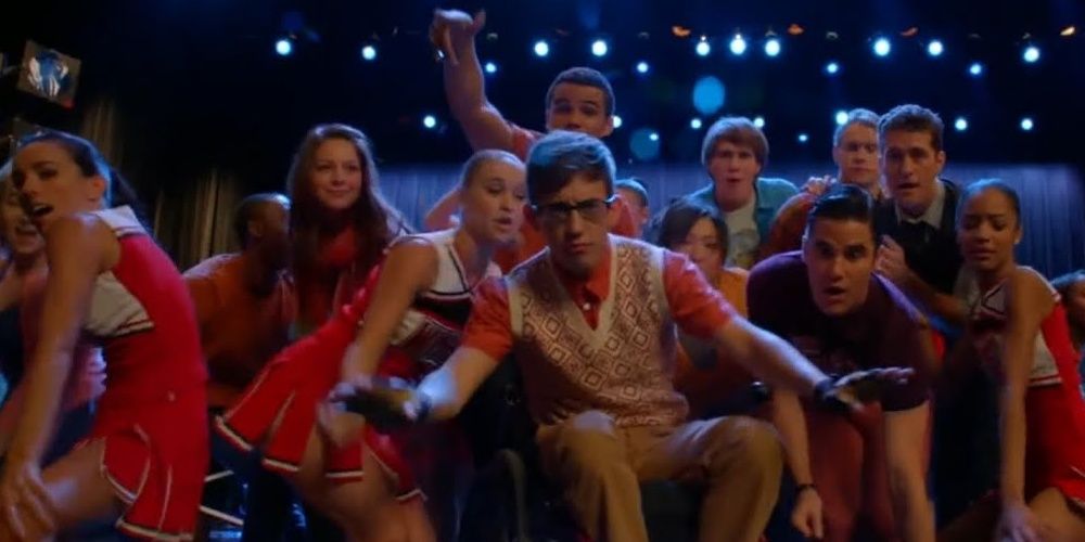 The New Directions performing Blurred Lines on stage