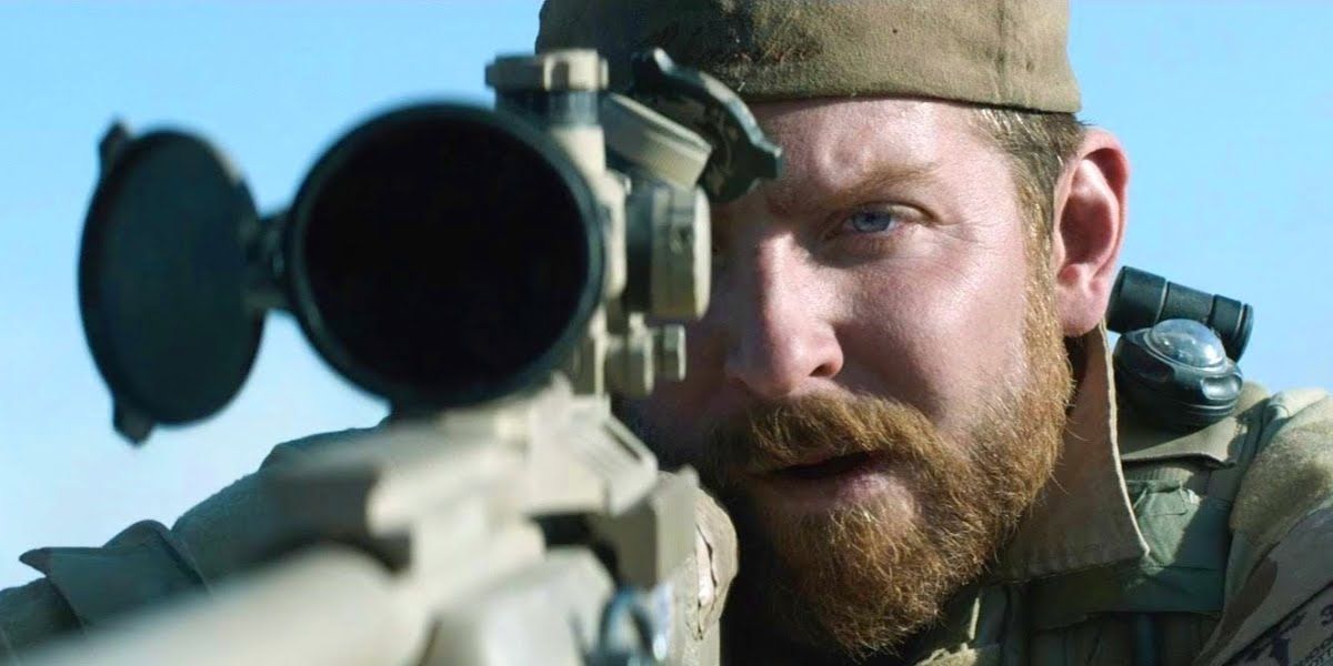 Bradley Cooper firing a sniper rifle in American Sniper