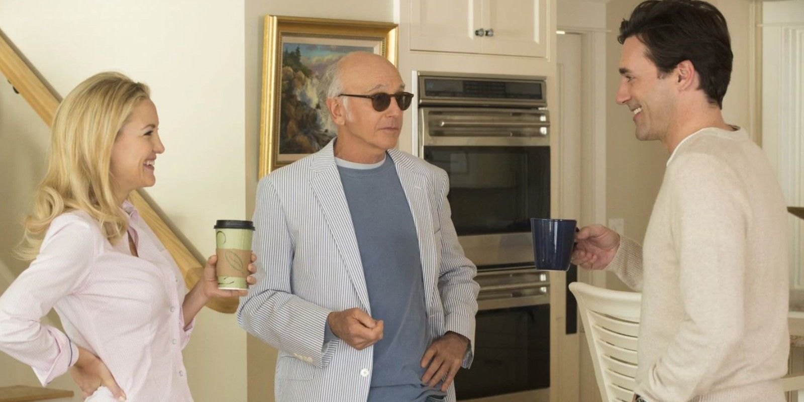 Kate Hudson, Larry David, and John Hamm stand together in a scene for Clear History
