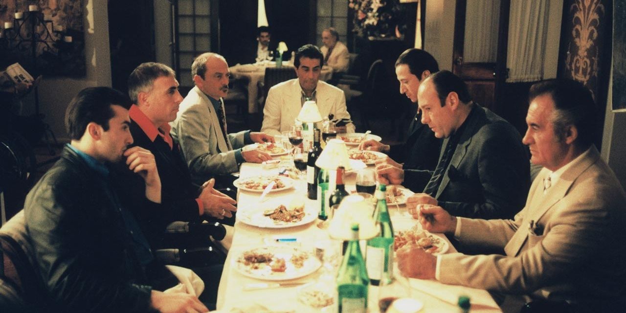 Characters sitting around a table in The Sopranos
