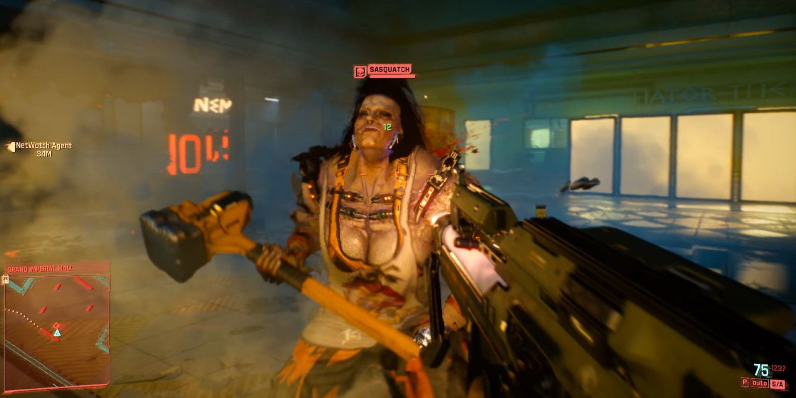 Someone holding a gun towards the character Sasquatch in Cyberpunk 2077 from a first-person perspective.
