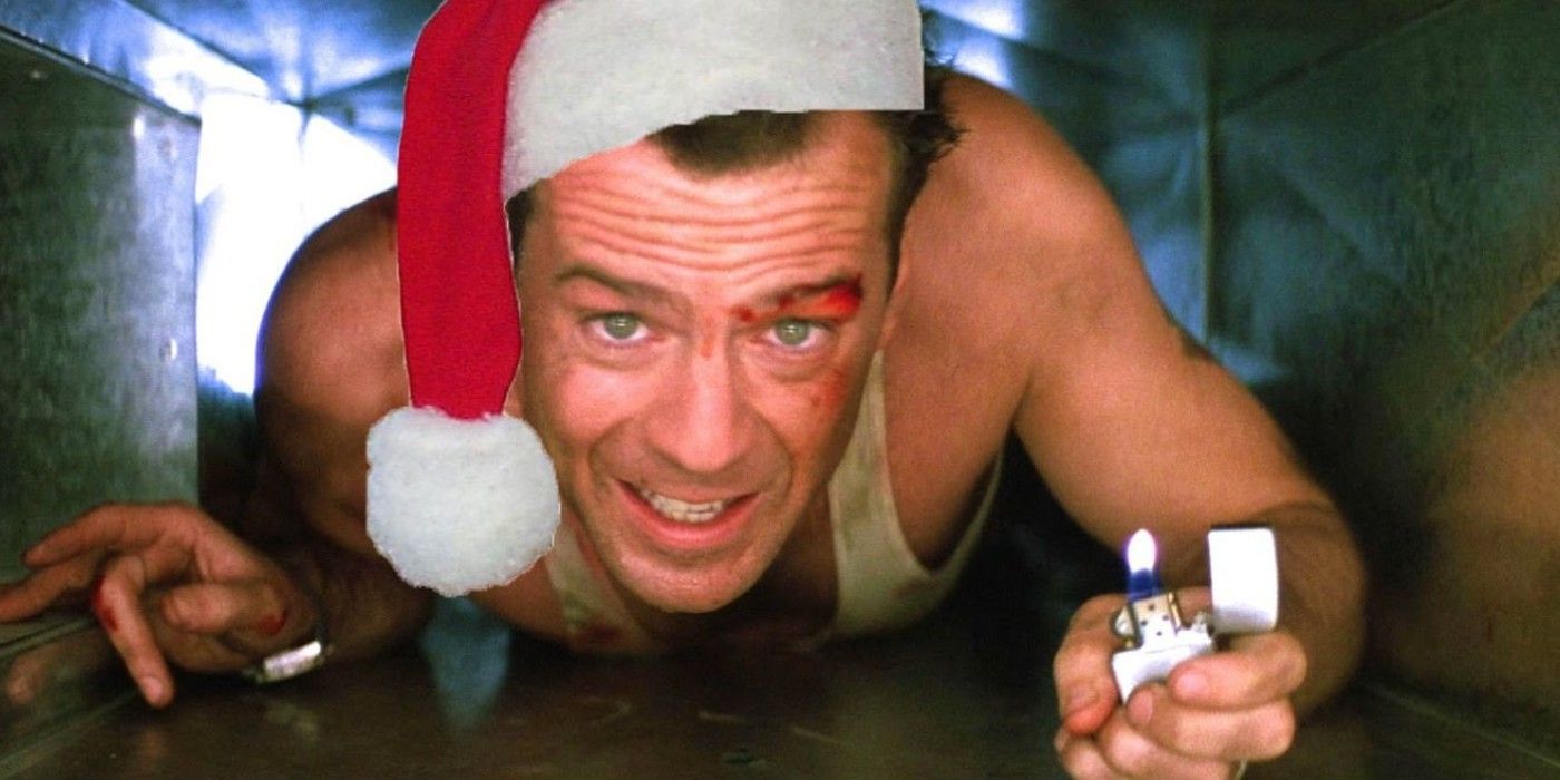 Bruce Willis crawling through the duct in Die Hard with a Christmas hat on