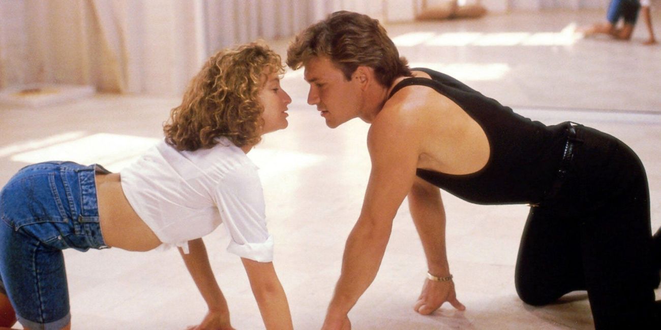 Dance scene from Dirty Dancing with Jennifer Gray and Patrick Swayze crawling on the floor.