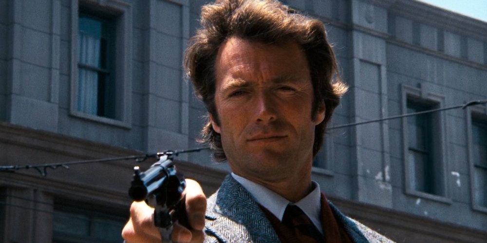 Dirty Harry intimidates a bank robber reaching for a shotgun in Dirty Harry