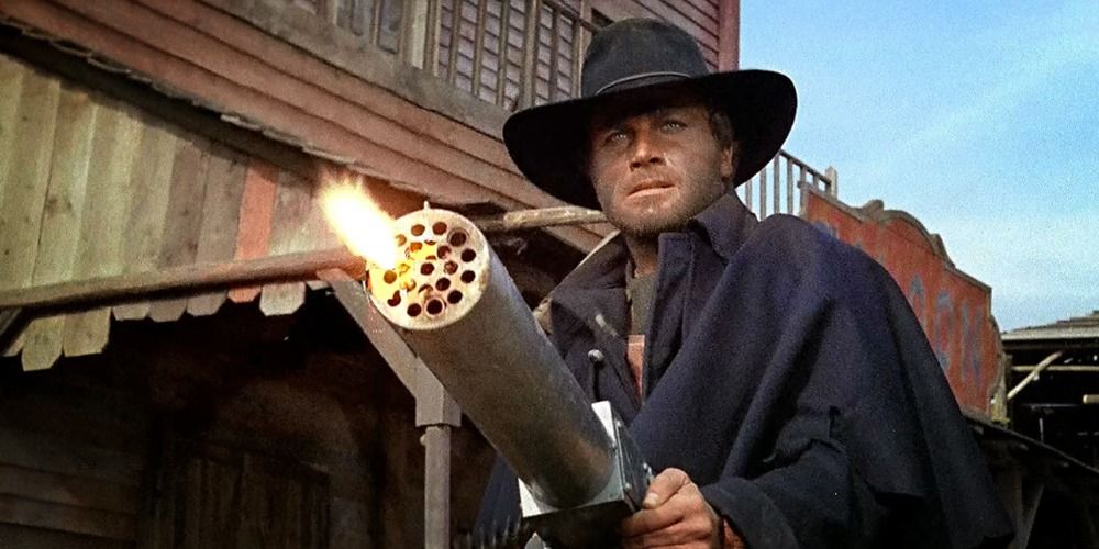 The main character Django firing a machine gun in Django