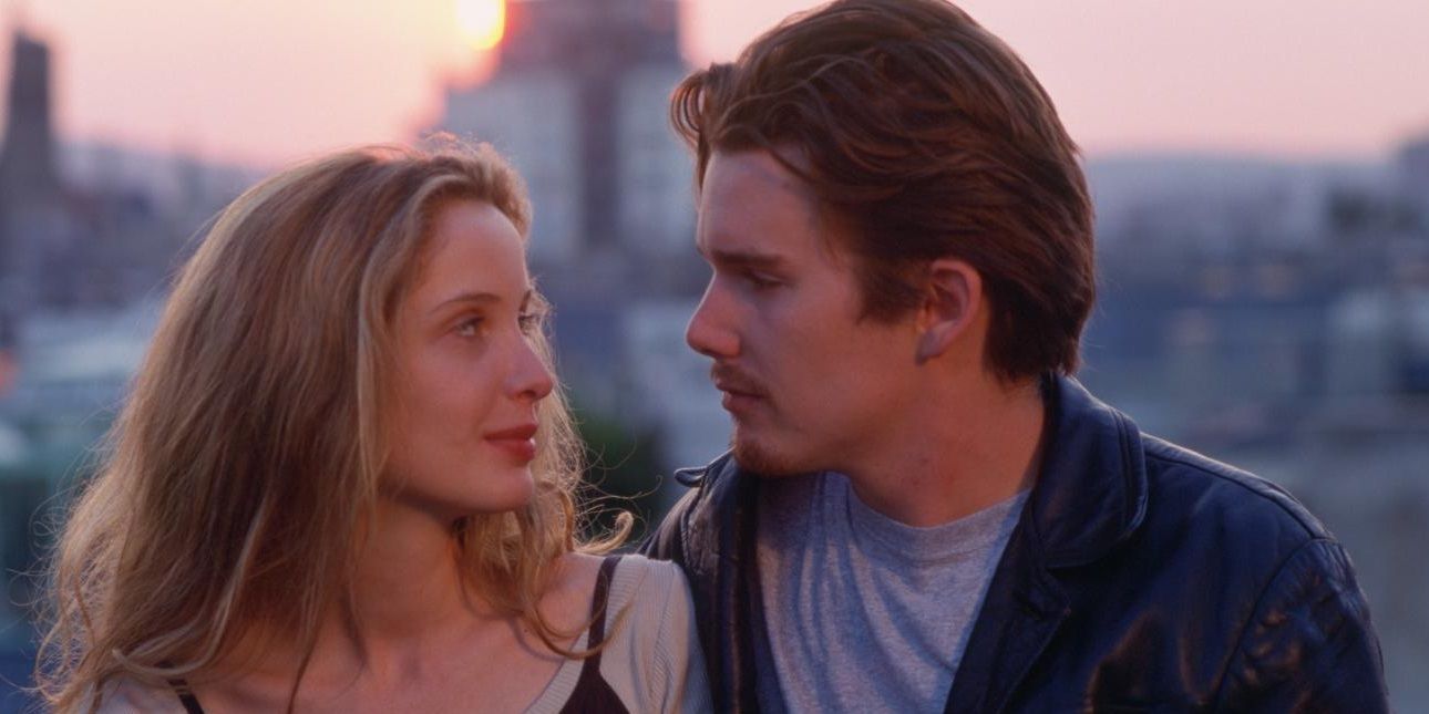 Ethan Hawke and Julie Delpy look at each other in Before Sunrise.