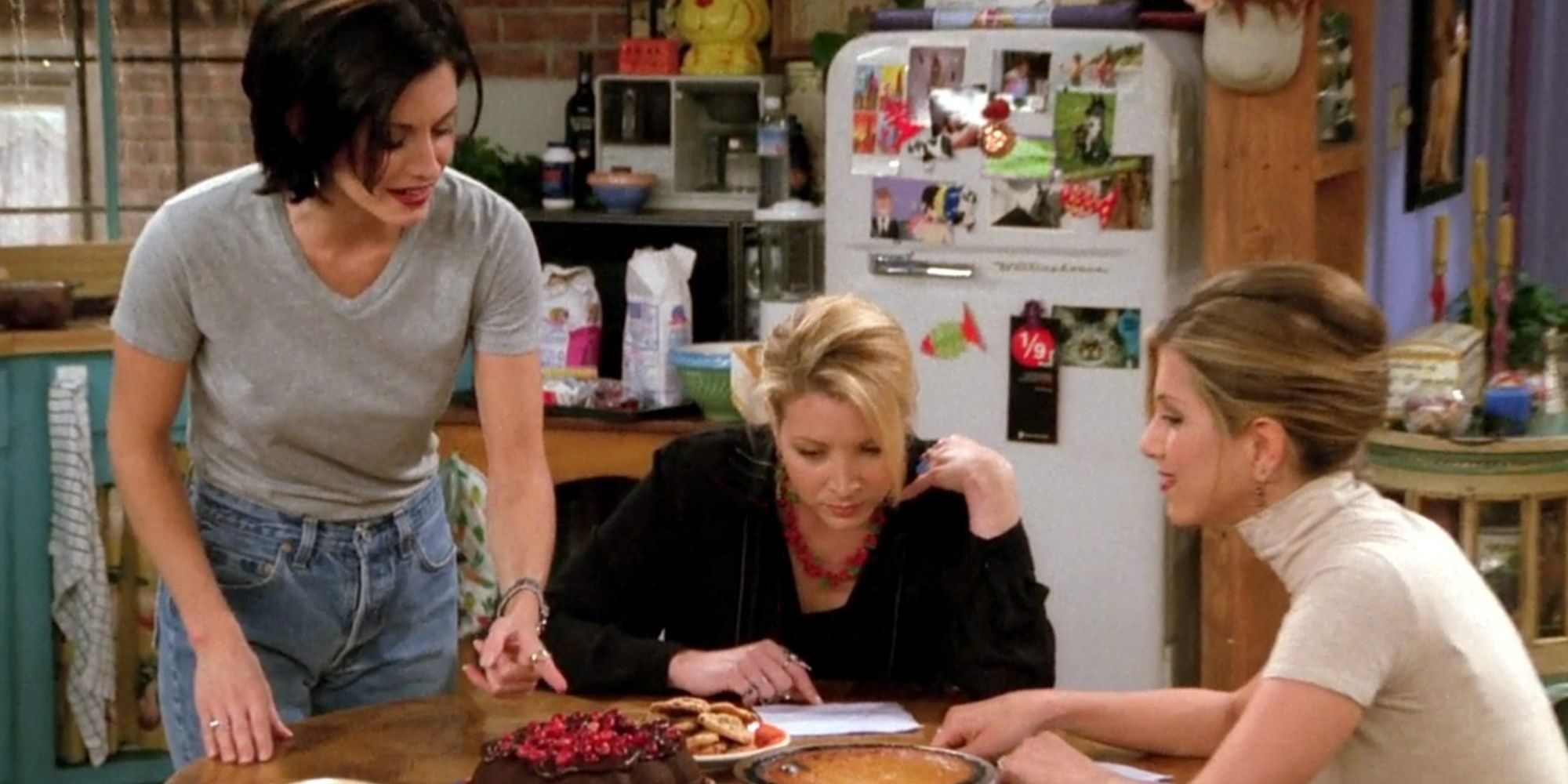 Monica gives Phoebe and Rachel a plate of mockolate sweets in Friends