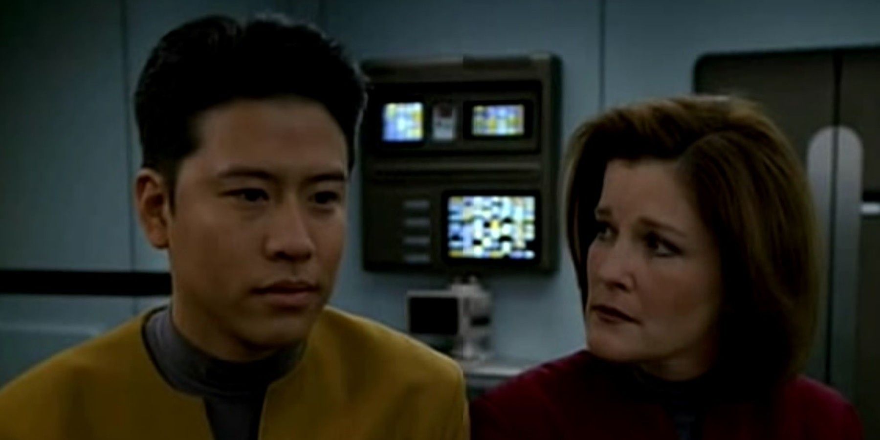 Garrett Wang as Harry Kim and Kate Mulgrew as Janeway in Star Trek Voyager