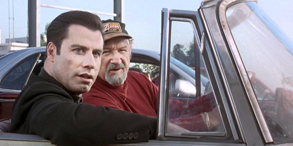 Chili and Harry ride around in a convertible in Get Shorty