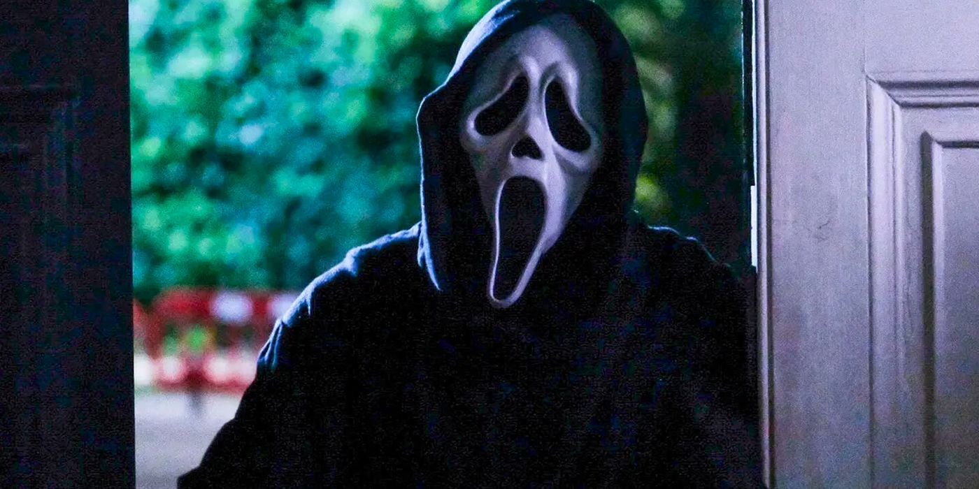 Ghostface stands in a doorway in Scream.