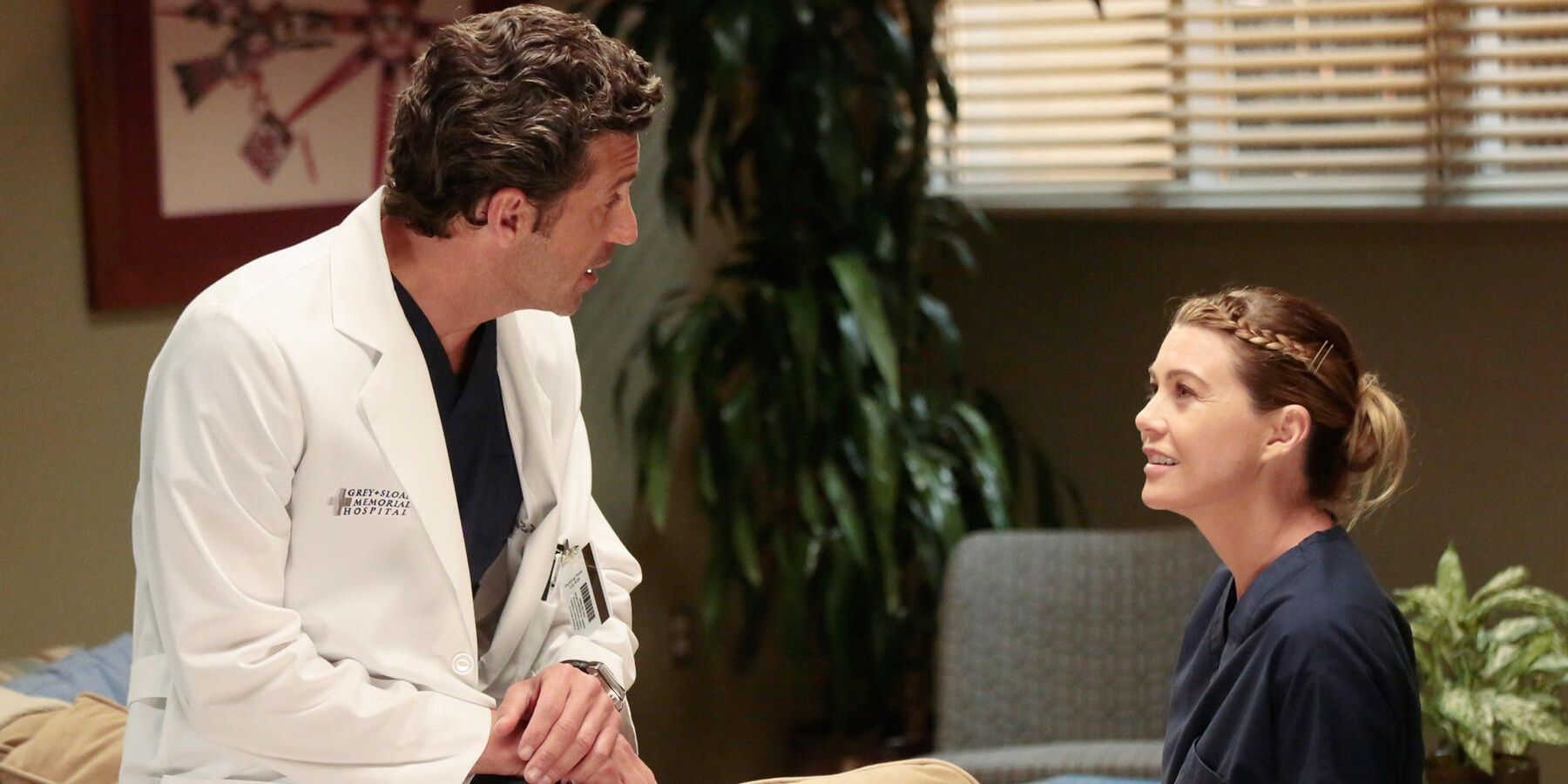 Derek and Meredith talking at the hospital on Grey's Anatomy