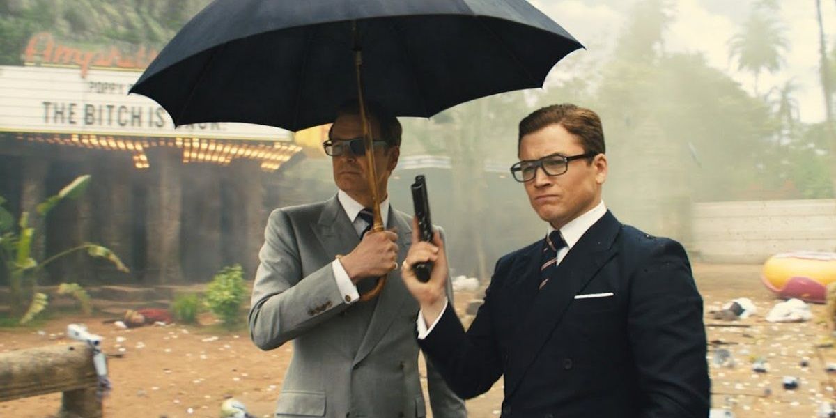 Harry and Eggsy under an umbrella in Kingsman The Golden Circle