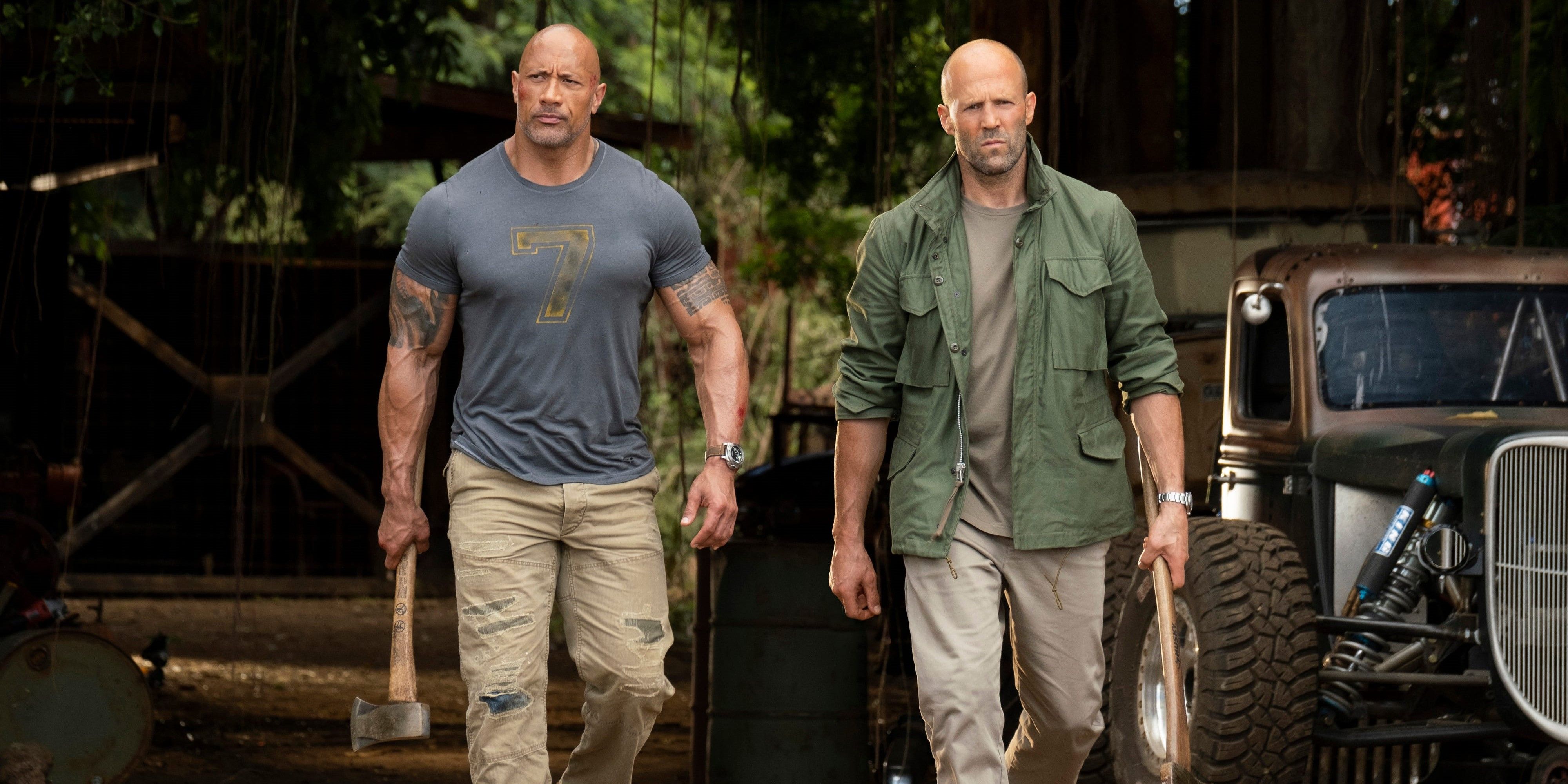Hobbs and Shaw walk while holding a hammer and a bat, respectively
